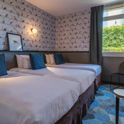 Driepersoonskamer Drie losse eenpersoonsbedden