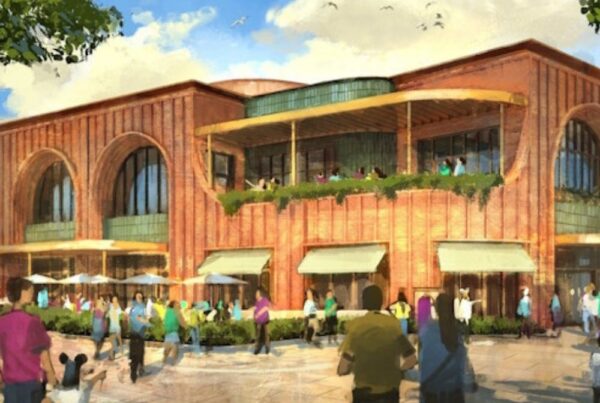 Concepttekening van Casa Giulia met een bruine buitenkant met groene luifels en een terras op zowel de begane grond als 1e verdieping